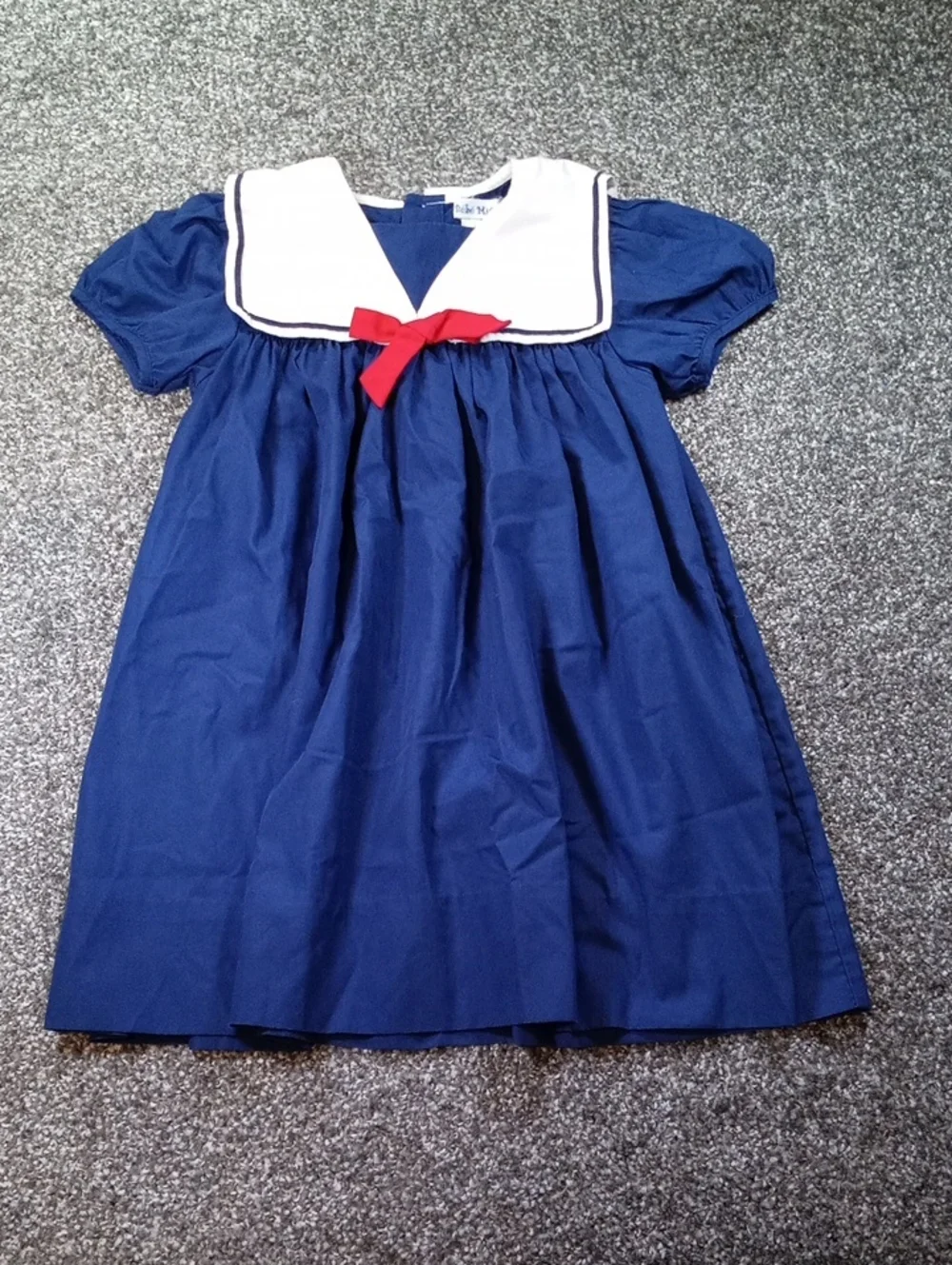 Mignon Navy and White Sailor-Trim Top with Red Bow Accent